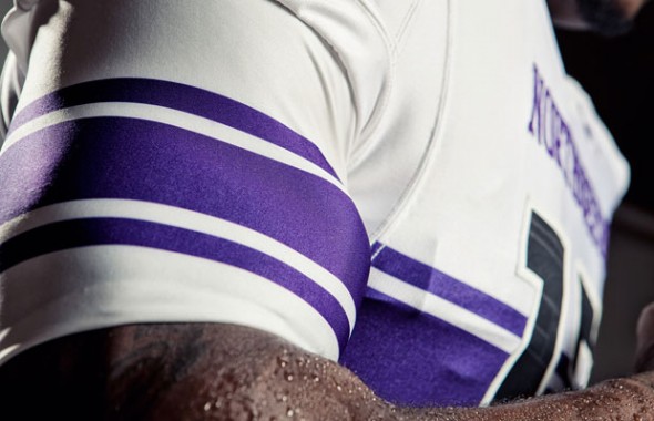 northwestern university new uniforms uni under armour wildcats white stripe detail