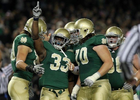 Pics Notre Dame s Shamrock Series Uniforms In Action SportsLogos 