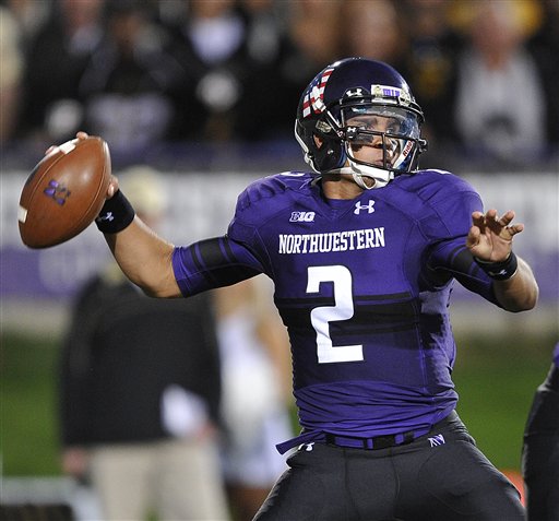 SportsLogos.Net Best/Worst 2012 college football NCAA best uniform - Northwestern purple black QB