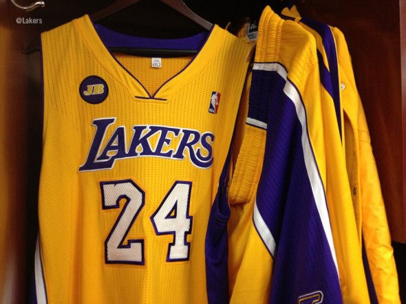 Jerseys hanging - LA Los Angeles Lakers Jerry Buss memorial patch jersey