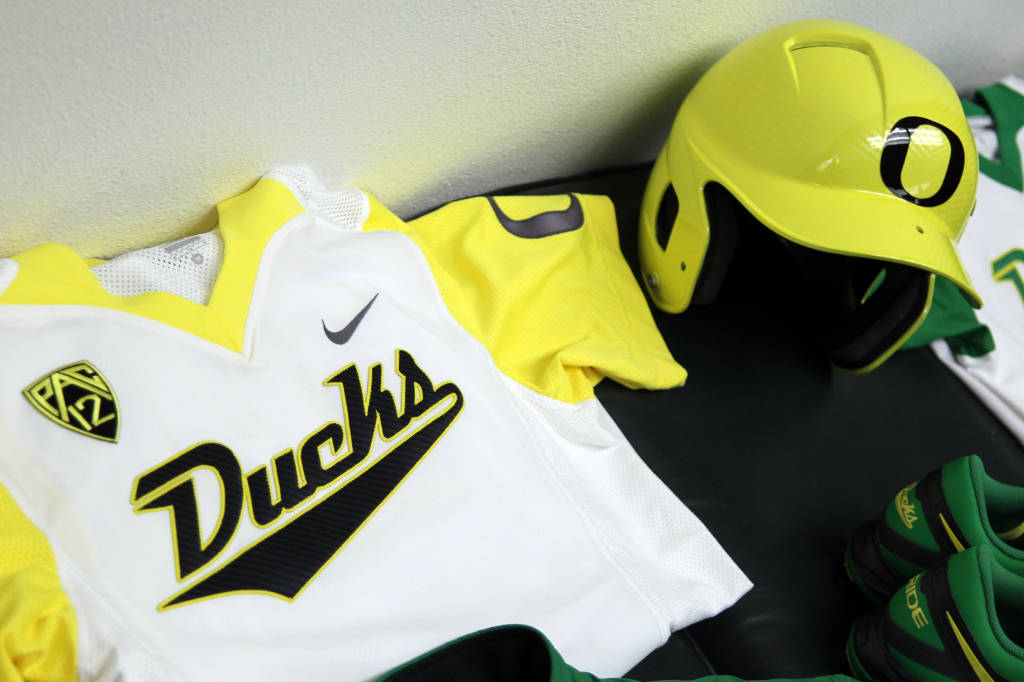 Oregon Ducks Women's softball new uniforms - white yellow. 
