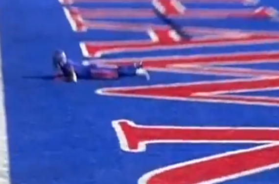 Kansas football player uses endzone to camouflage himself