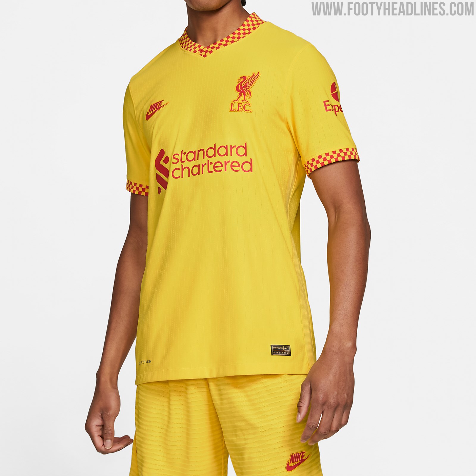 Liverpool yellow kit