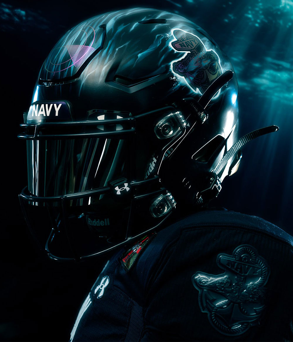 Other details in the uniform include the silhouette of a submarine on